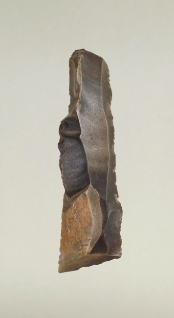 Sold Paleolithic spearhead