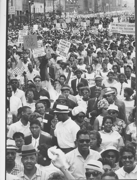 African Americans carry signs protesting discrimination during ...